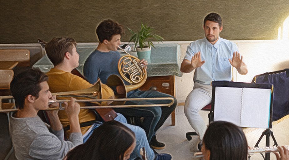Middle-schoolers playing musical instruments in a band